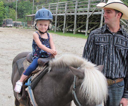 Elizabeth rides the pony